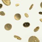 Falling gold coins depicting different currencies