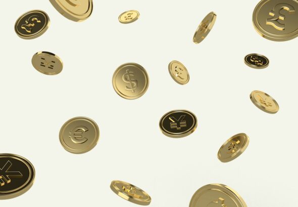 Falling gold coins depicting different currencies
