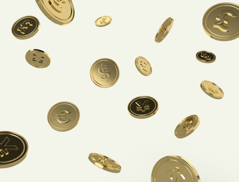 Falling gold coins depicting different currencies